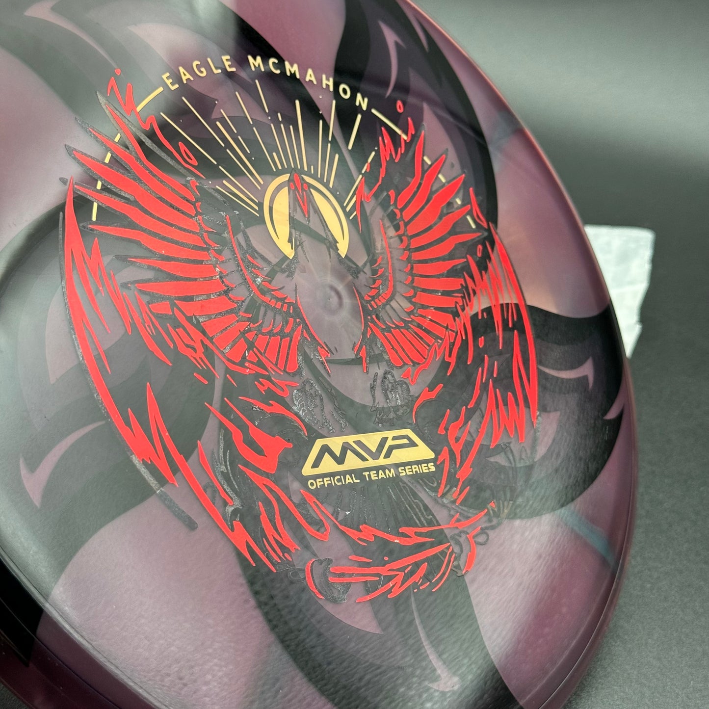 Lore | Axiom Eagle McMahon Team Series Prism Proton Envy | Black/Red/Gold/Holo Ghost | 174g