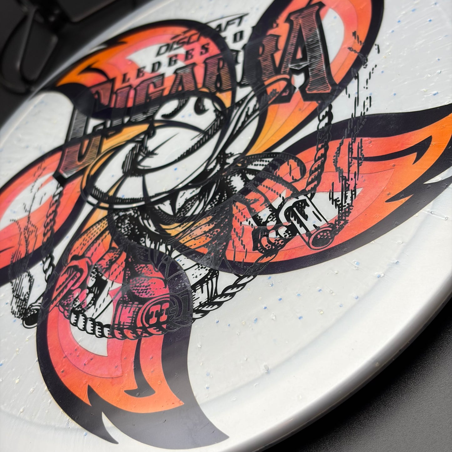 Lore | Discraft 2026 Ledgestone Ti Sparkle Cigarra | Matte Black/Black Hidden Stars | 175g