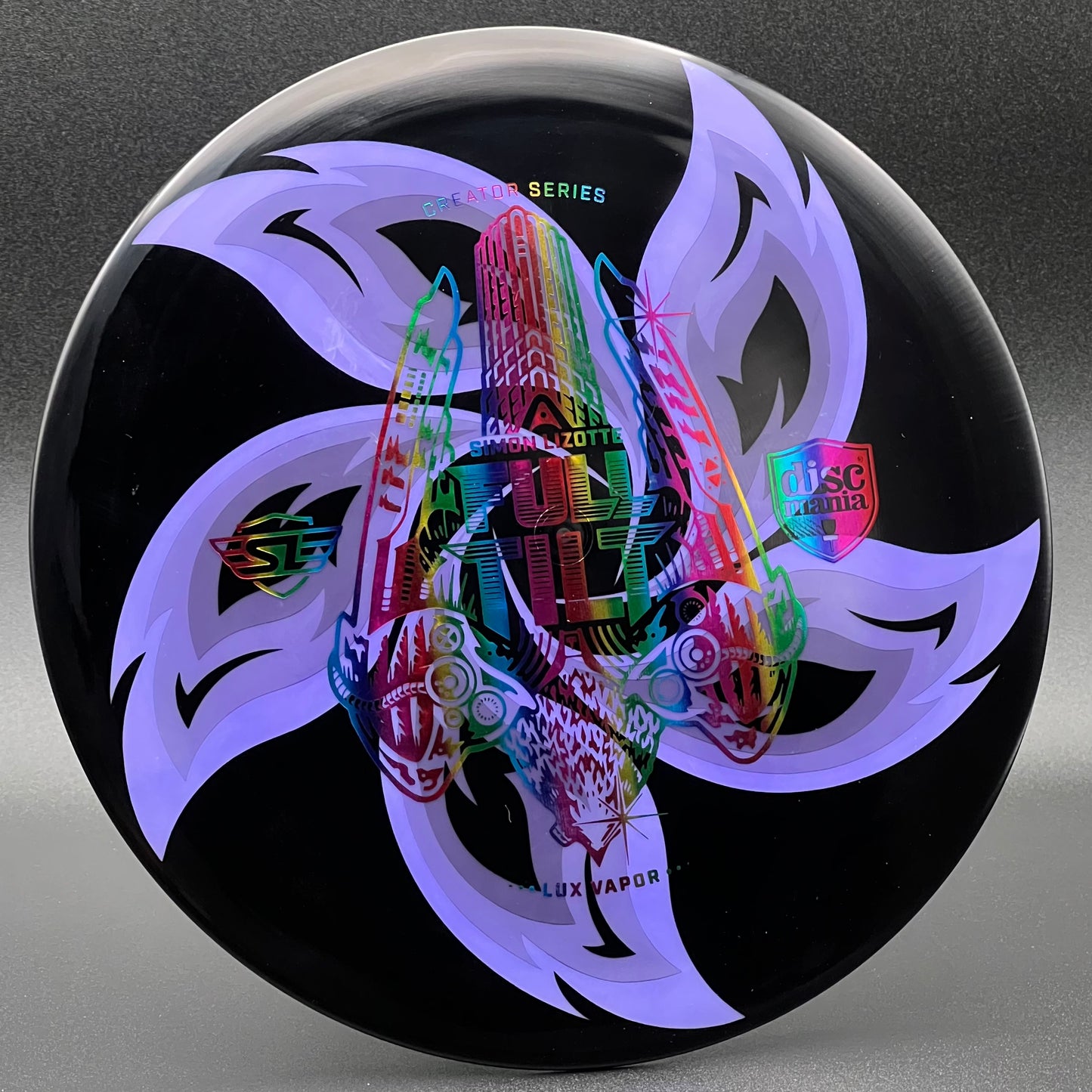 LORE | Discmania Simon Lizotte Creator Series Lux Vapor Tilt | Flat Rainbow/Pink Flowers | 175g